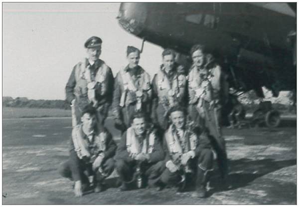 Crew with Nav. Newman - on the left standing - likely with crew Hunter - crop photo