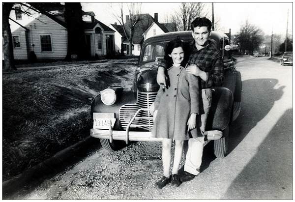 Milton with his sister Dixie in front of Pontiac GM, Dyer